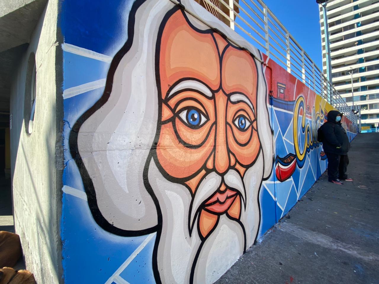 Unidad de muralistas de la Municipalidad de Iquique realiza obra de más de 30 metros cuadrados en Caleta Cavancha